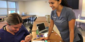 A student at UB, one of the best online dental hygiene master’s programs in CT